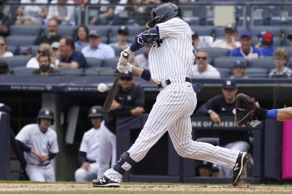 New York Yankees' Isiah Kiner-Falefa hits a an RBI-double in the first inning of a baseball game, Sunday against the Chicago Cubs, June 12, 2022, in New York. (AP Photo/Mary Altaffer)