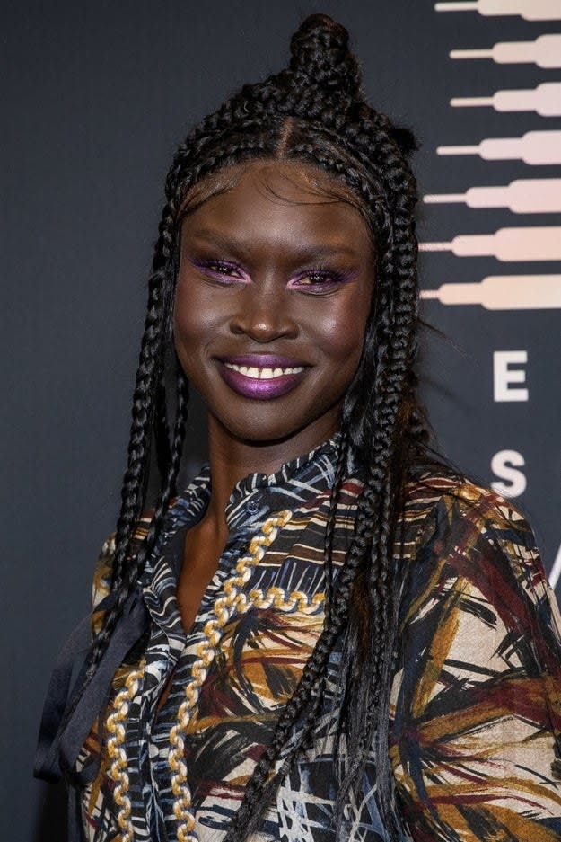 Alek Wek smiles at Rihanna's Savage X Fenty Show Vol. 3 on September 24, 2021