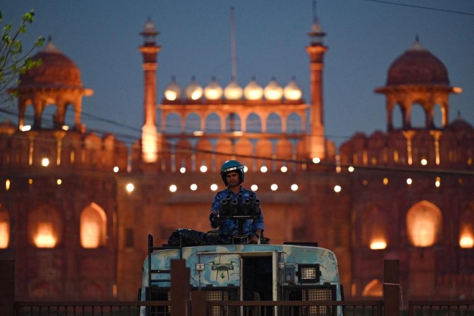 A soldier stands guard outside the Red Fort during protests over Rahul Gandhi’s criminal defamation case (AFP/Getty)