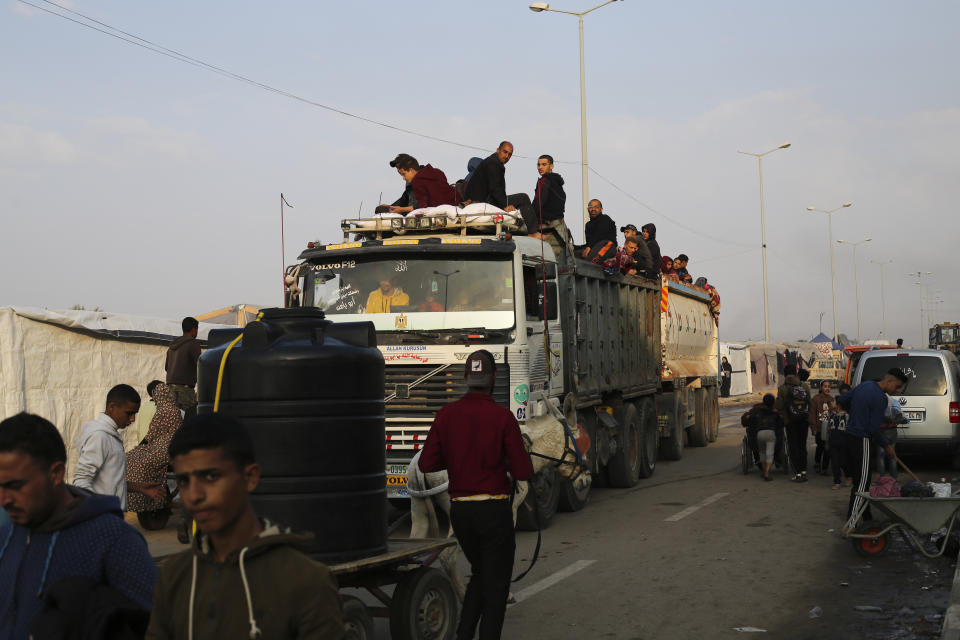 Palestinians fleeing the Israeli bombardment of the Gaza Strip arrive in Rafah Wednesday, Dec. 27, 2023. (AP Photo/Hatem Ali)