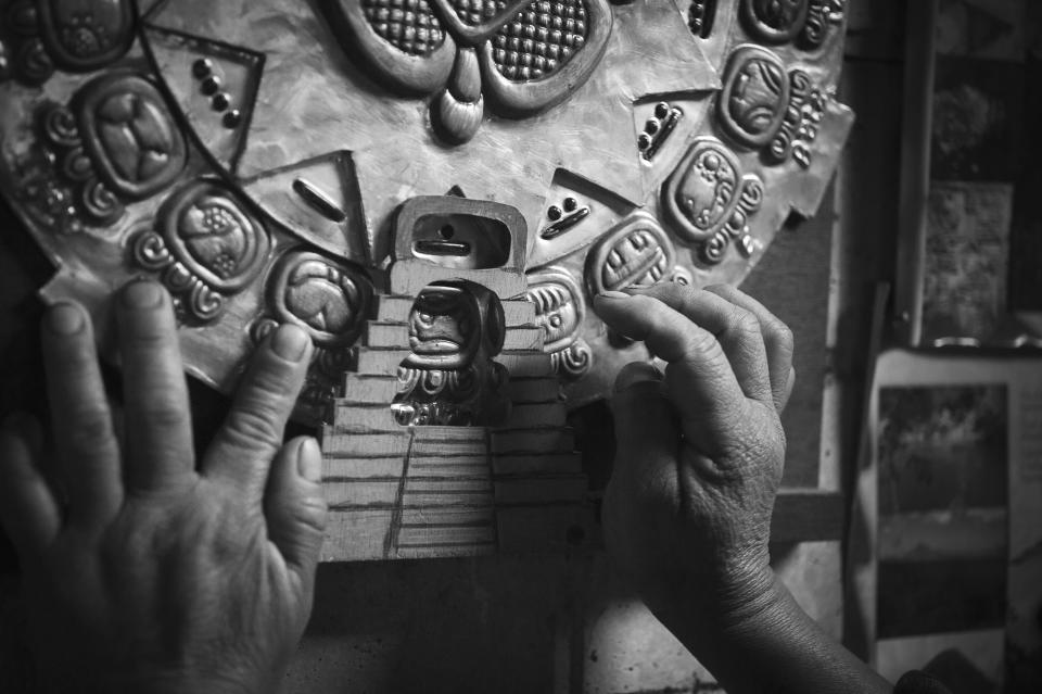 <p>Shaman Tata’ Xuan uses the ritual Maya calendar in his practice. (Photograph by Fran Antmann) </p>