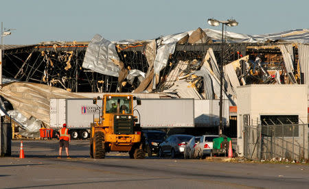 A Procter and Gamble warehouse is damaged after a tornado ripped through the area on Sunday in Albany, Georgia. REUTERS/Tami Chappell