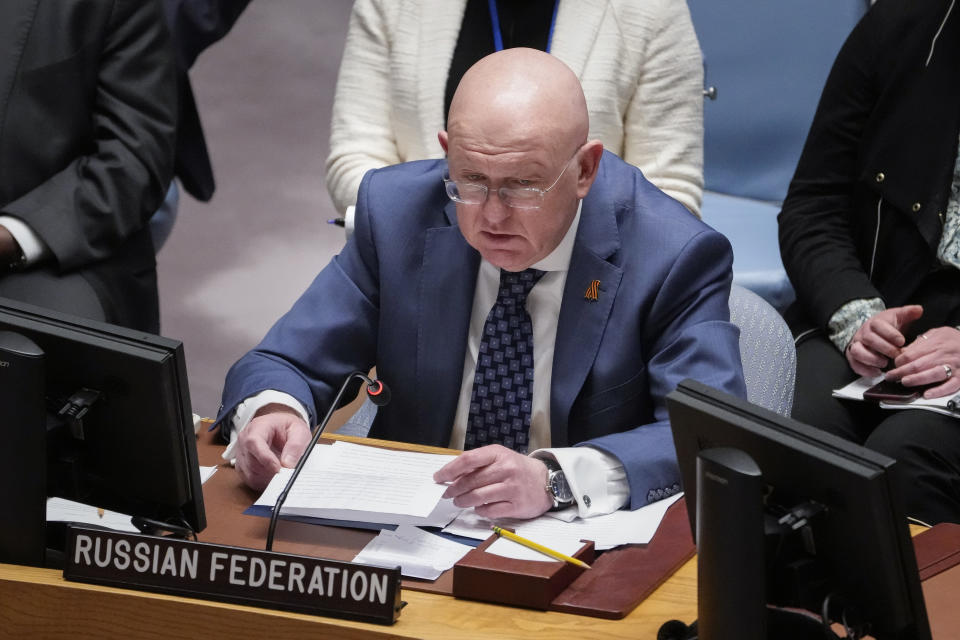 Vassily Nebenzia, Permanent Representative of Russia to the United Nations, speaks as Ignazio Cassis, Federal Councillor for Foreign Affairs of Switzerland and current president of the United Nations Security Council presides over a meeting of the council, Wednesday, May 3, 2023, at United Nations headquarters. (AP Photo/John Minchillo)