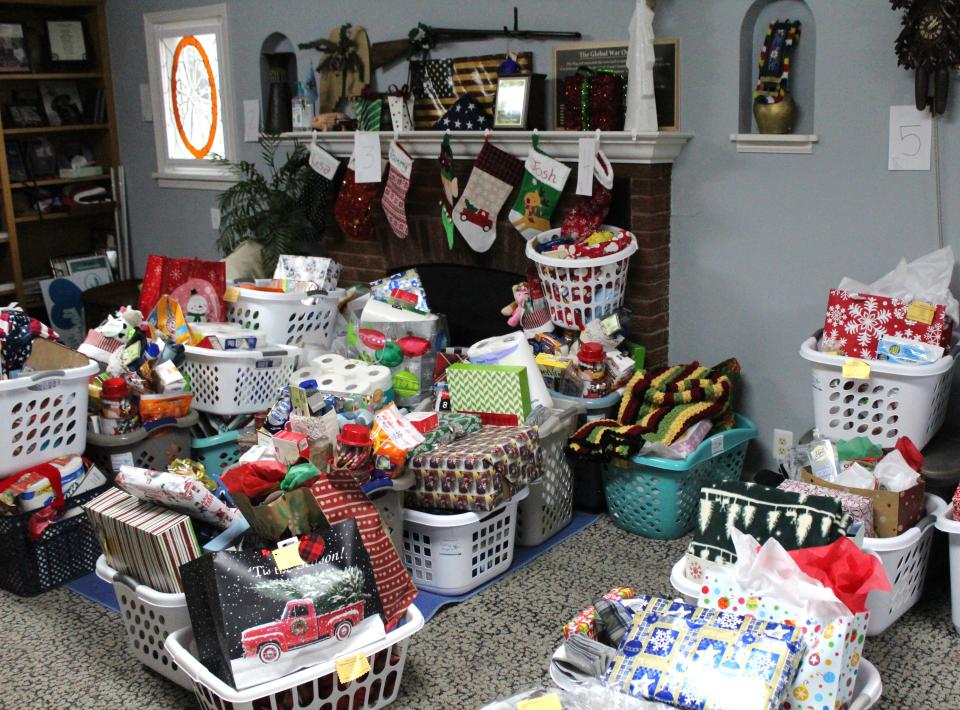 As part of Operation Christmas Drop, an Angels 4 Vets project, baskets filled with toiletries, nonperishable food, gift cards and cleaning supplies are delivered to local disabled and homebound veterans.