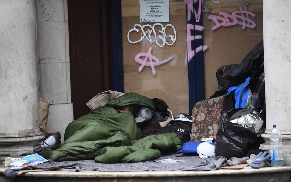 File photo dated 28/01/20 of a homeless man sleeping in a doorway. The Local Government Secretary has warned there is still more work to be done to help rough sleepers, claiming 90% of them have been offered accommodation during the coronavirus crisis. PA Photo. Issue date: Saturday April 18, 2020. See PA story HEALTH Coronavirus.