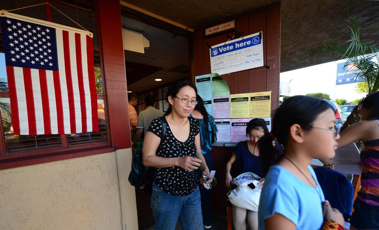 <span class="caption">Asian American voters leave a Temple City, California, polling place in 2012, in the state's first legislative district that is majority Asian American.</span> <span class="attribution"><a class="link " href="https://www.gettyimages.com/detail/news-photo/asian-americans-vote-on-election-day-at-a-dennys-restaurant-news-photo/155682080" rel="nofollow noopener" target="_blank" data-ylk="slk:Frederic J. Brown/AFP via Getty Images;elm:context_link;itc:0;sec:content-canvas">Frederic J. Brown/AFP via Getty Images</a></span>