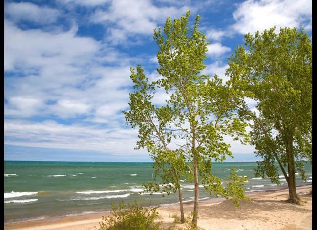 <strong><a href="http://www.cntraveler.com/daily-traveler/chicago/2013/06/chicago-indiana-dunes-day-trip?mbid=synd_huffpotravel" target="_hplink">IF YOU'RE IN CHICAGO…</a></strong>  …Explore the Indiana Dunes    Soft, sandy dunes give way to miles of pristine beachfront along Lake Michigan. But the real treat are the five homes re-located from the 1933 World’s Fair. Designed to showcase the latest developments in design, building materials and techniques, the houses include the especially notable flamingo-pink, terraced Florida Tropical House and the twelve-sided House of Tomorrow, featuring an in-house airplane hangar. Find the homes along the 100 block of West Lake Front Drive—three sit on a cliff that overlooks the water, while the other two are on the beach directly below.