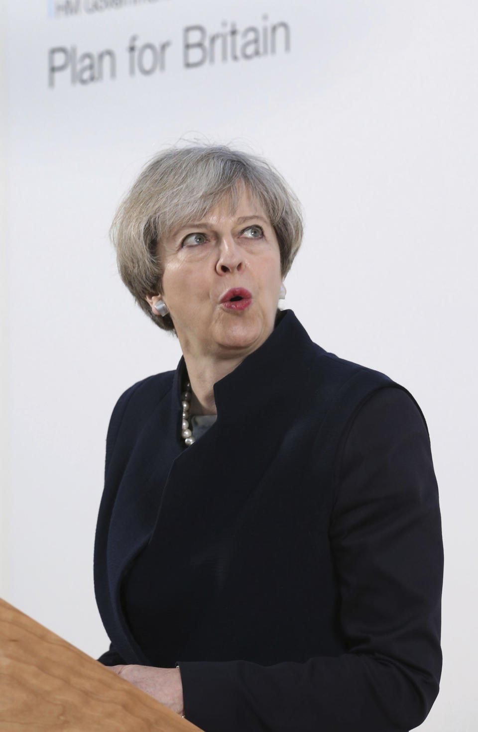 Britain's Prime Minister Theresa May gives a speech at the Department for International Development's office at Abercrombie House in East Kilbride Scotland Monday March 27, 2017. May will later meet Scotland's leader Nicola Sturgeon for the first time since they faced off in a struggle over a new push for Scottish independence as the U.K. leaves the European Union. (Jane Barlow/PA via AP)