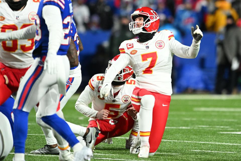 Chiefs kicker Harrison Butker (7) kicks a field goal against the Bills during the first half of their AFC divisional round game at Highmark Stadium in Orchard Park, N.Y., on Jan. 21, 2024.