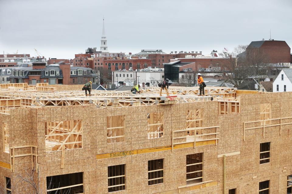Work continues Monday at the Residence at Foundry Place in Portsmouth, a condo project located adjacent to the city's Foundry Place Parking Garage.