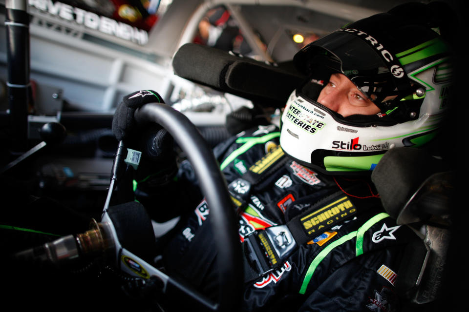 DOVER, DE - SEPTEMBER 30: Kyle Busch, driver of the #18 Interstate Batteries Toyota, prepares to drive during practice for the NASCAR Sprint Cup Series AAA 400 at Dover International Speedway on September 30, 2011 in Dover, Delaware. (Photo by Chris Graythen/Getty Images)