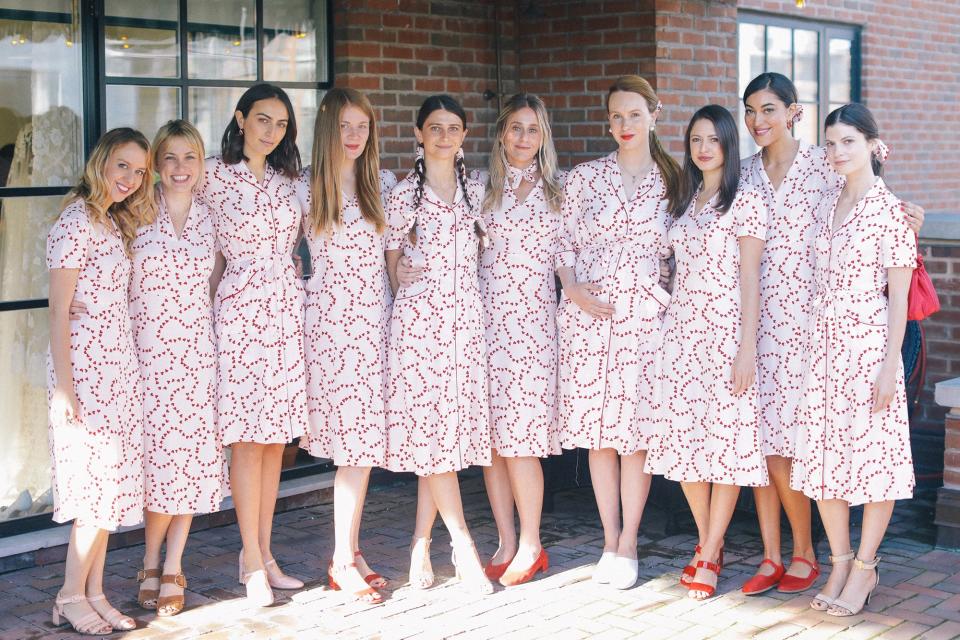 Jordan, Morgan, Rio, Clara, Lily, Cassie, Saree, Nora, Sarah, and Courtney. My 10 gorgeous bridesmaids wearing matching String of Heart–print dresses from my line HVN. These ladies have been my best friends for more than a decade.