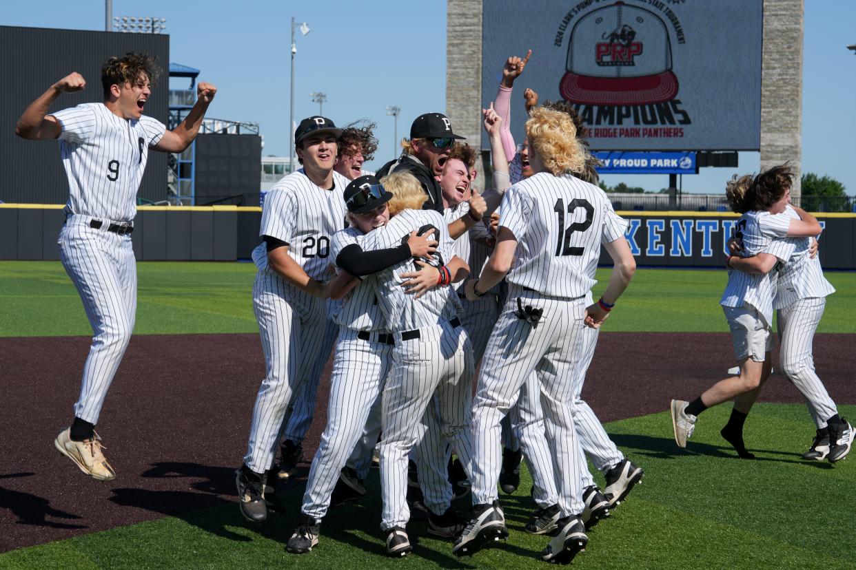 Pleasure Ridge Park celebrates its 4-1 win over McCracken County for the state baseball championship.