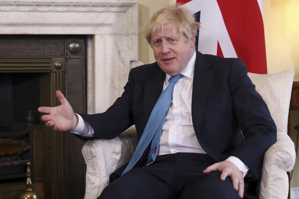 Britain's Prime Minister Boris Johnson speaks with Lithuania's Prime Minister Ingrida Simonyte at Downing Street in London, Tuesday Feb. 8, 2022. (Tom Nicholson/Pool via AP)