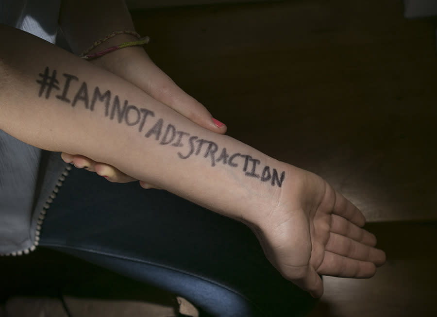 Molly Neuner wrote ‘#IAMNOTADISTRACTION’ on her arm. (Photo: Portland Press Herald/Getty Images)