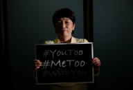 Social Democratic Party's lawmaker Mizuho Fukushima poses with the #MeToo banner during an interview with Reuters in Tokyo, Japan, April 24, 2018. REUTERS/Toru Hanai