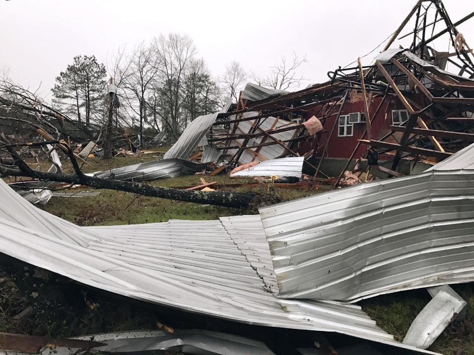 Debris lies on the ground after a storm south of Mount Olive, Miss., moved through the area Monday, Jan. 2, 2017. Forecasters say damaging winds, hail and flash flooding will be possible on Monday as a storm system moves across the South. (Ryan Moore/WDAM-TV via AP)