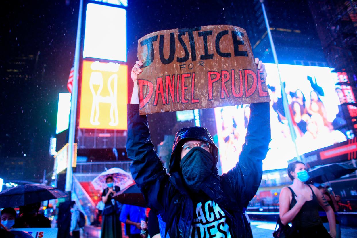 <p>File Image: A demonstrator holds a sign during a protest to demand justice for Daniel Prude, on 3 September  2020 in New York City</p> (Getty Images)