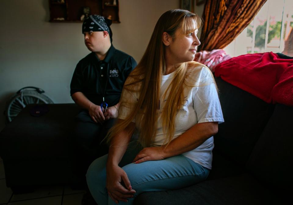 Christina Lockyer and her son Steven, in Bakersfield. Lockyer feared passing the virus to him.