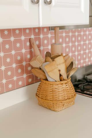 <p><a href="https://abeautifulmess.com/removable-tile-backsplash-my-mini-kitchen-refresh/" data-component="link" data-source="inlineLink" data-type="externalLink" data-ordinal="1">A Beautiful Mess</a></p>