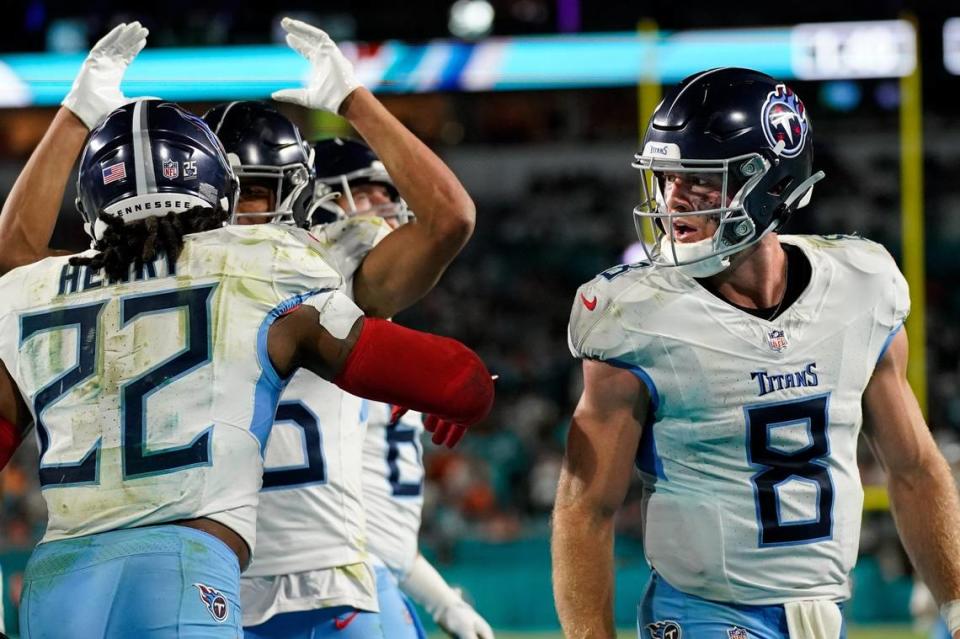 Tennessee Titans quarterback Will Levis (8) looks on as running back Derrick Henry (22) celebrates his touchdown that proved to be the game-winner against the Miami Dolphins on Monday night. Denny Simmons/USA TODAY NETWORK