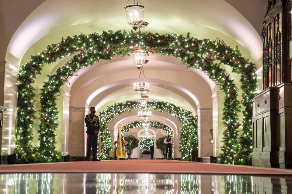 Christmas holiday wreaths are spread throughout the Center Hall of the White House on November 29, 2021 in Washington DC. This year's theme for the White House Christmas decorations is �Gifts from the Heart.� Photo by Ken Cedeno/Sipa USA.