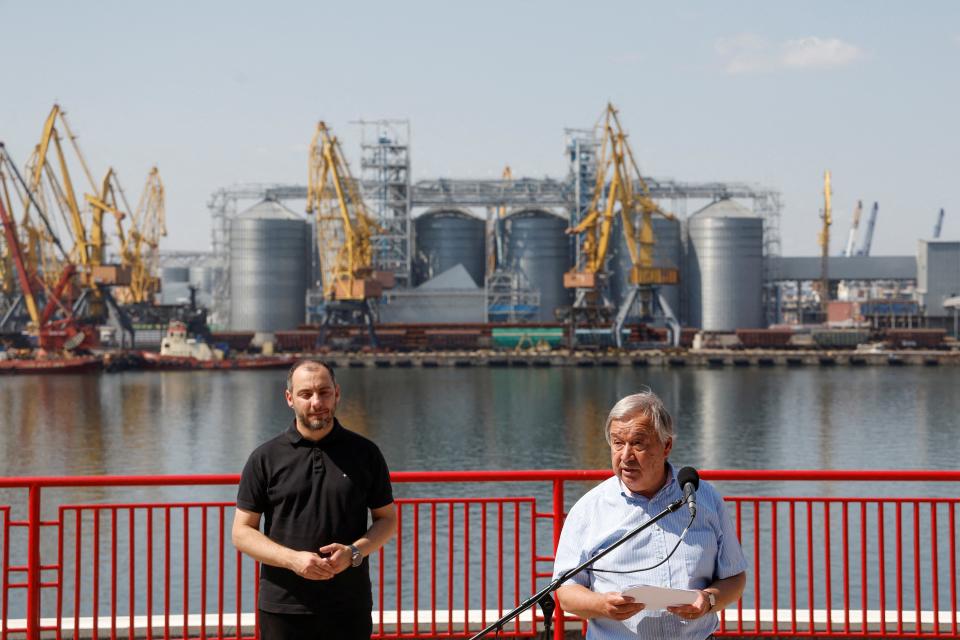 Guterres and Ukrainian infrastructure minister Oleksandr Kubrakov by the sea port in Odesa as exports restarted in summer (Reuters)
