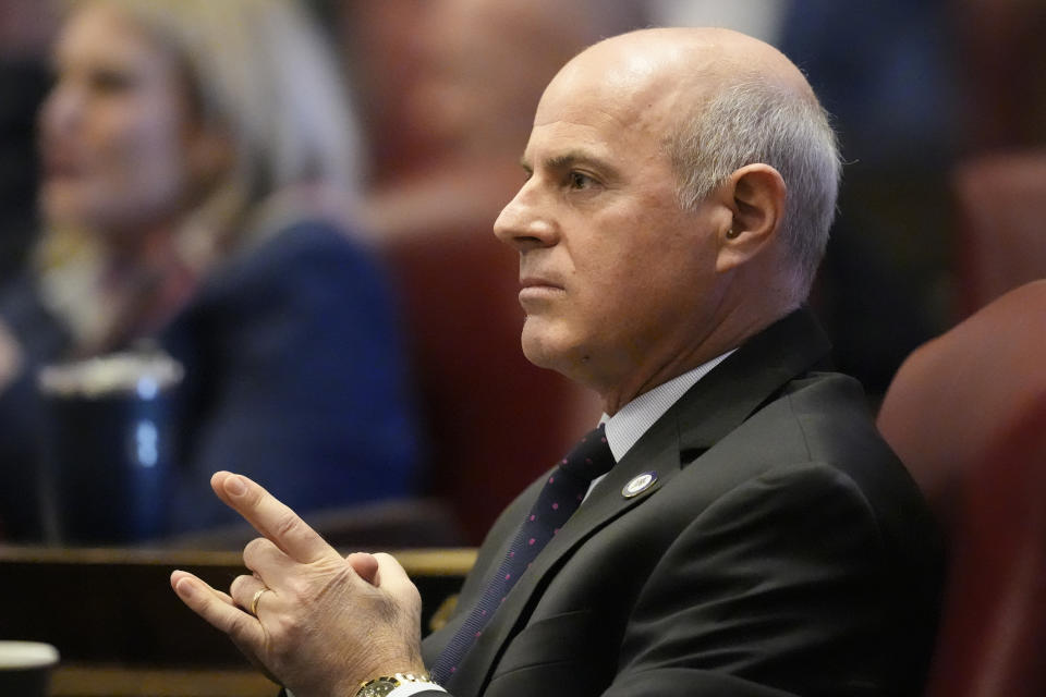 Rep. Gino Bulso, R-Brentwood, sits on the House floor during a legislative session Monday, Feb. 26, 2024, in Nashville, Tenn. Bulso sponsored a bill that bans the Pride flag from being displayed in schools. (AP Photo/George Walker IV)