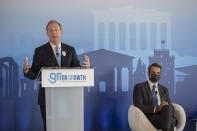 Microsoft President Brad Smith, left, speaks next to Greek Prime Minister Kyriakos Mitsotakis during a ceremony held in the Acropolis Museum, central Athens, on Monday, Oct. 5, 2020. Microsoft has announced plans to build three data centers in greater Athens, providing a badly needed investment of up to $1 billion to the Greek economy which has been hammered by the pandemic. (AP Photo/Petros Giannakouris)