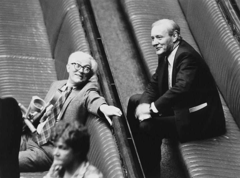 A family affair: Hilary Benn's father, the late Tony Benn (right), chats to then-Labour leader Michael Foot in the Commons in 1980. (Getty Images)