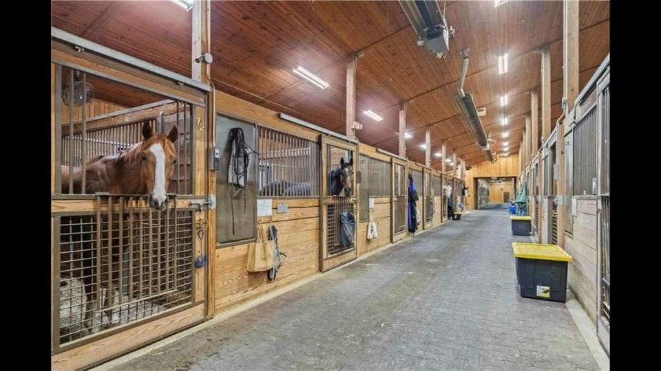 The property at 9100 Cedar Niles Road in Lenexa is set on 145.2 acres, with an 84-stable equestrian facility.