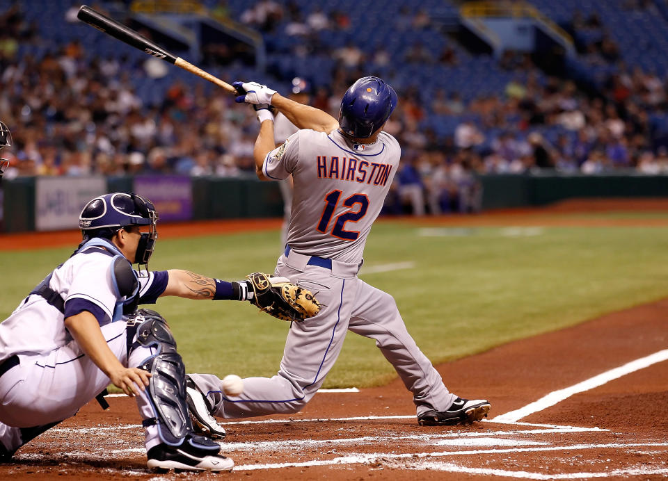 ST. PETERSBURG - JUNE 13: Outfielder Scott Hairston #12 of the New York Mets bats against the Tampa Bay Rays during the game at Tropicana Field on June 13, 2012 in St. Petersburg, Florida. (Photo by J. Meric/Getty Images)