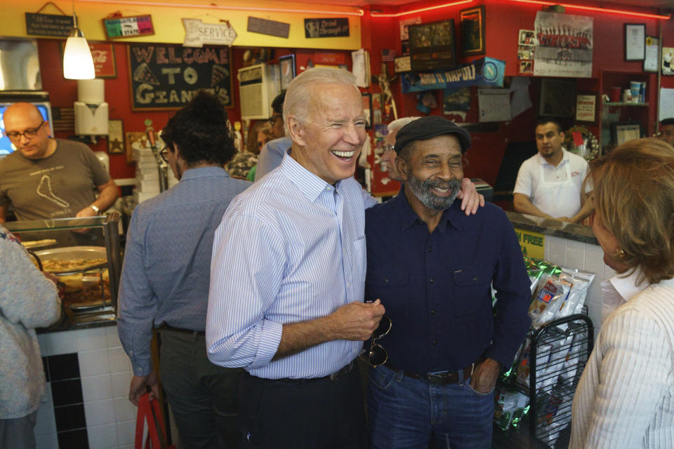 Democratic presidential candidate and former Vice President Joe Biden greets people at Gianni's Pizza, in Wilmington Del., Thursday, April 25, 2019. (Photo: Jessica Griffin/The Philadelphia Inquirer via AP)