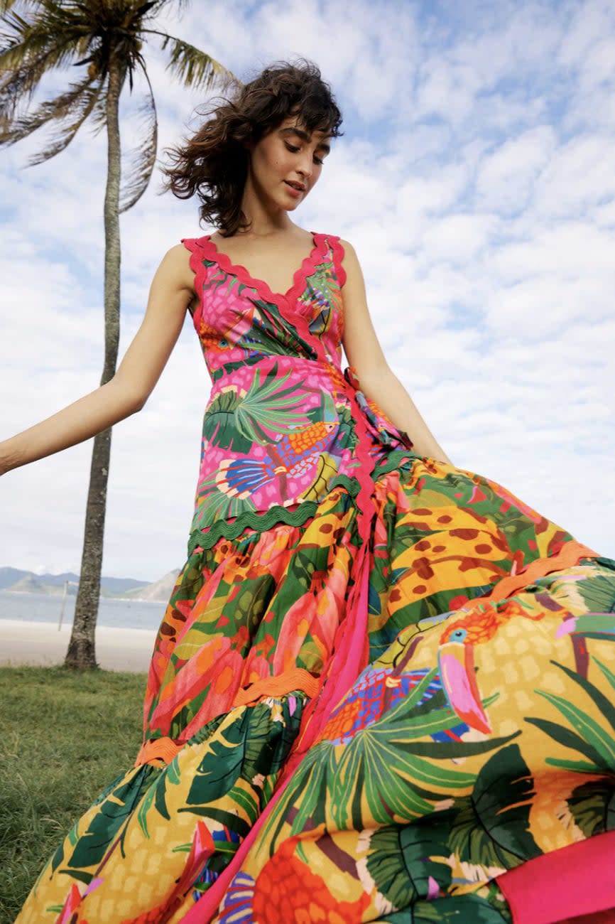<p>Win best dressed on your next vacation in this fabulous <span>Farm Rio Mixed Painted Toucans Wrap Maxi Dress</span> ($248, originally $275), which includes rickrack detailing. It's made of 100 percent cotton.</p>