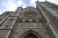 This Friday, Jan. 22, 2021, photo shows the Cathedral of the Holy Cross in Boston. Overall, the nearly 200 dioceses in the U.S. and other Catholic institutions received at least $3 billion from the federal government’s small business emergency relief program. That makes the Roman Catholic Church perhaps the biggest beneficiary of the paycheck program, according to data the U.S. Small Business Administration released following a public-records lawsuit by AP and other news organizations. (AP Photo/Bill Sikes)