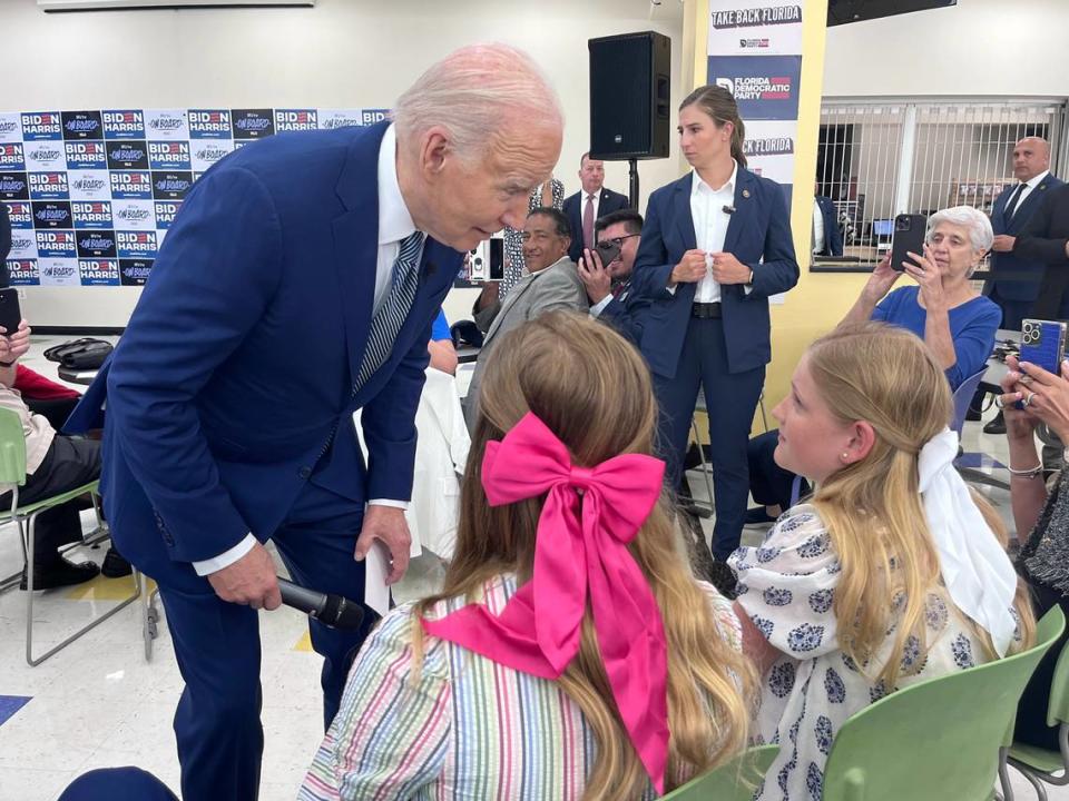 President Joe Biden tells two young girls they deserve ice cream for sitting through his campaign speech at Hillsborough Community College Dale Mabry in Tampa on Tuesday, April 23, 2024.