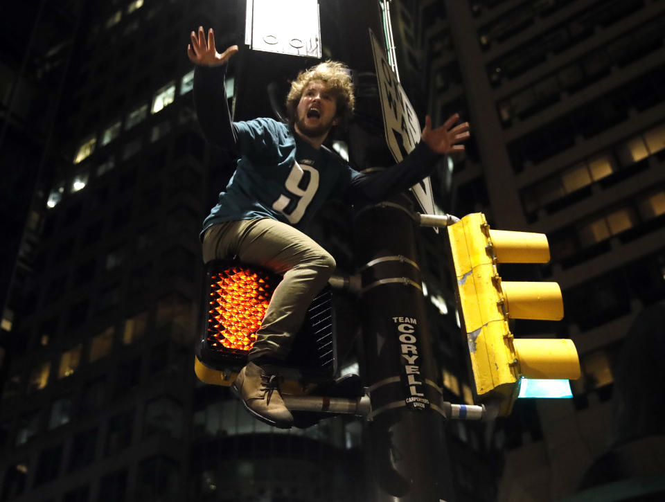 <p>A Philadelphia Eagles fan celebrates the team’s victory in the NFL Super Bowl 52 between the Philadelphia Eagles and the New England Patriots, Sunday, Feb. 4, 2018, in downtown Philadelphia. (AP Photo/Matt Rourke) </p>