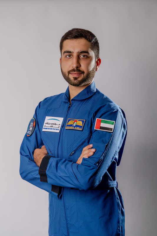 Emirati national Mohammad al-Mulla, selected to train as an astronaut, poses for a photo