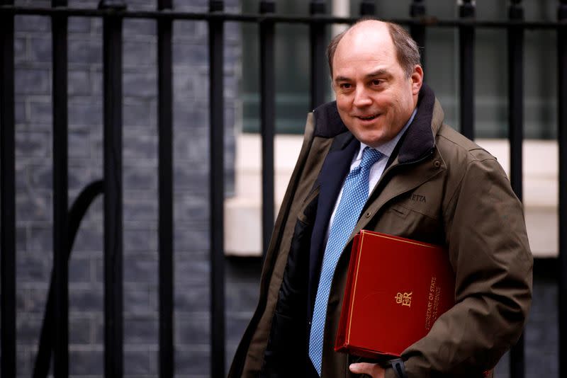 FILE PHOTO: Britain's Defence Secretary Ben Wallace walks outside Downing Street in London