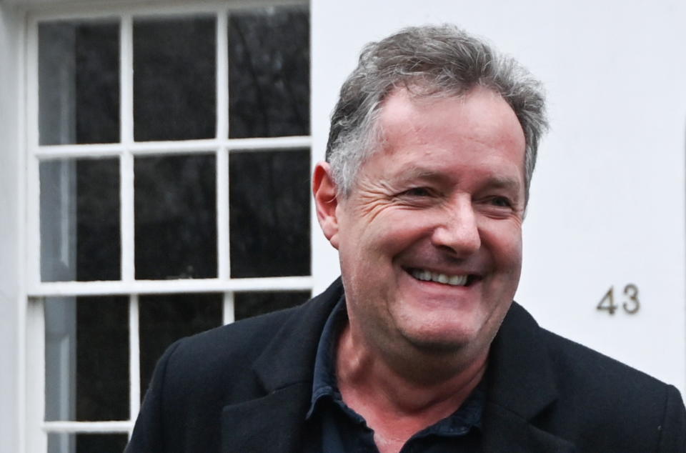 Journalist and television presenter Piers Morgan smiles as he steps out of his house, after he left his high-profile breakfast slot with the broadcaster ITV, following his long-running criticism of Prince Harry's wife Meghan, in London, Britain, March 10, 2021. REUTERS/Toby Melville