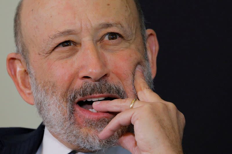 FILE PHOTO: Blankfein, CEO of Goldman Sachs, reacts at Boston College Chief Executives Club luncheon in Boston