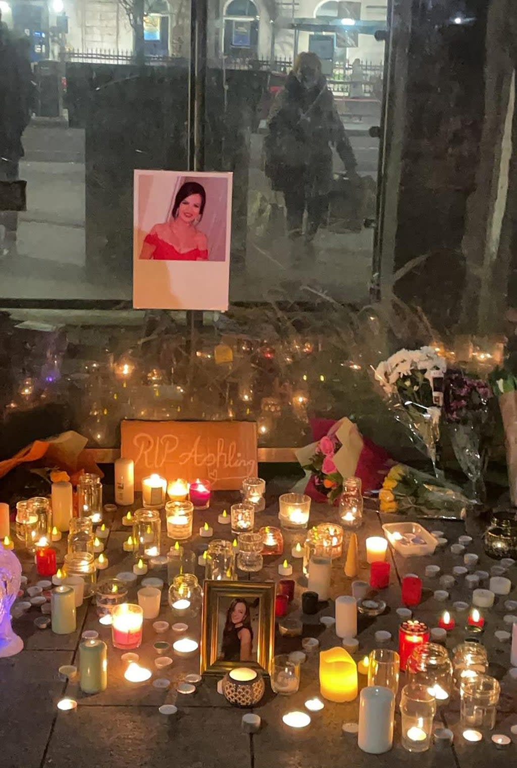 Floral tributes at a vigil attended by hundreds in Galway city centre for Ashling Murphy (Roisin Nic Lochlainn/PA) (PA Media)