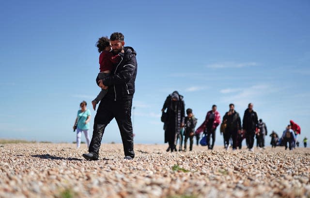 Asylum seekers on beach