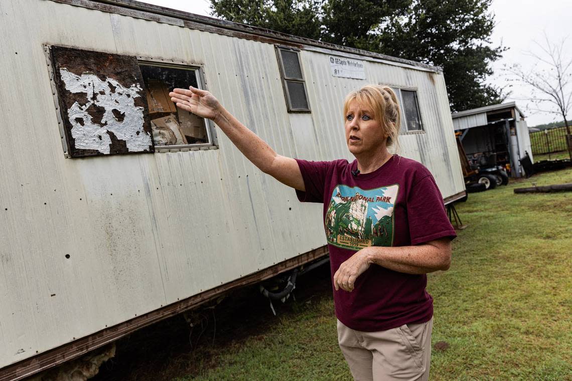 Springtown resident Cynthia Courtney points to the areas of her home affected by flooding she has dealt with since the D.R. Horton subdivision was built behind her property in 2023. According to Courtney, the construction has disrupted the natural drainage pattern and has since caused substantial flooding in and around her home.