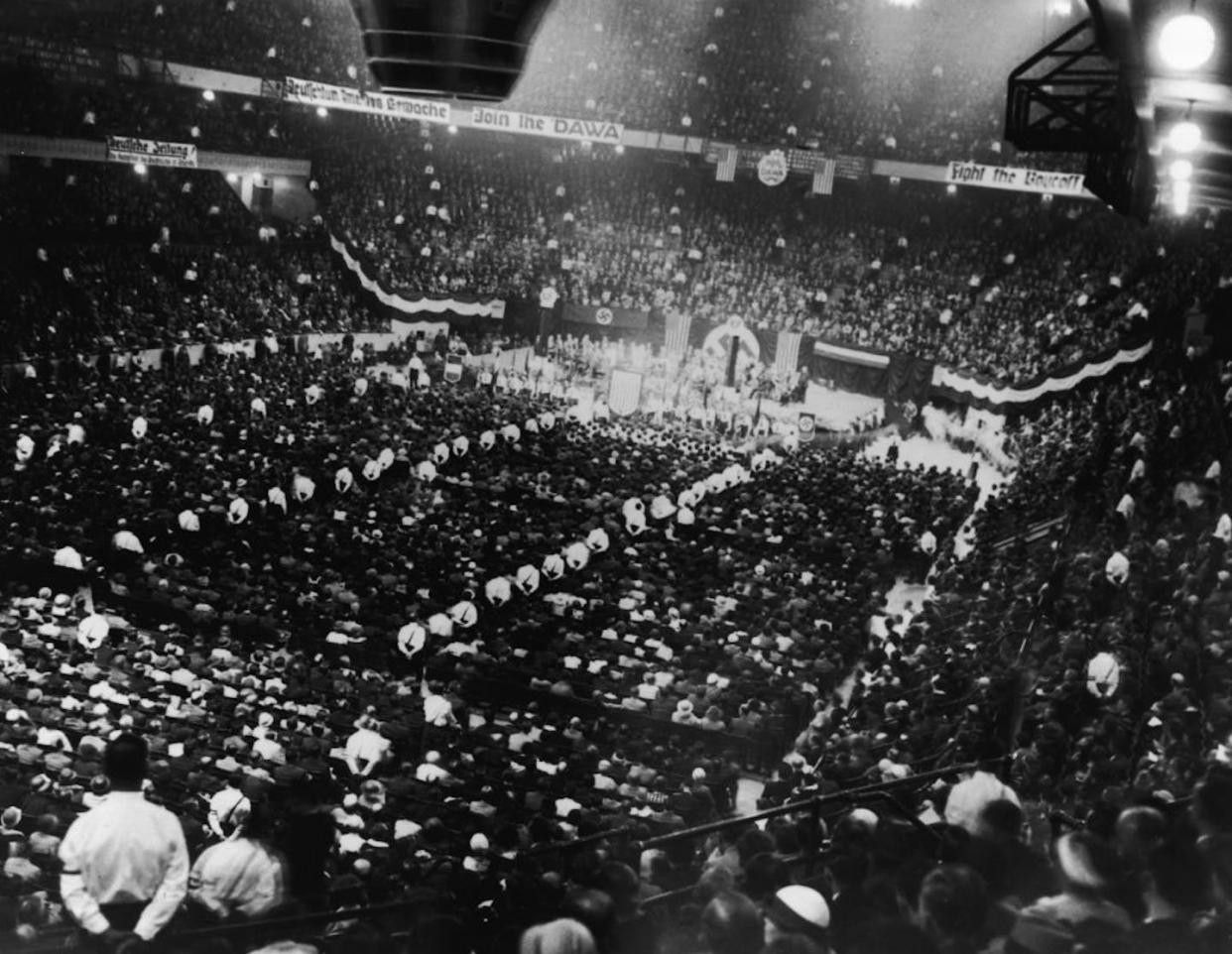 Thousands of people attend a pro-Nazi rally at Madison Square Garden in New York in May 1934, with counterprotestors outside. <a href="https://www.gettyimages.com/detail/news-photo/approximately-20-000-people-attend-a-pro-nazi-germany-rally-news-photo/2961927?adppopup=true" rel="nofollow noopener" target="_blank" data-ylk="slk:Anthony Potter Collection/Hulton Archive via Getty Images;elm:context_link;itc:0;sec:content-canvas" class="link ">Anthony Potter Collection/Hulton Archive via Getty Images</a>