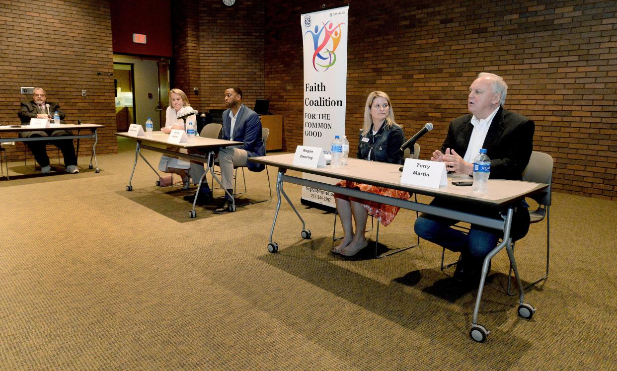 Candidates for the 13th Congressional District meet Tuesday night during a forum at Lincoln Library. From left to right are Nikki Budzinski, David Palmer, Regan Deering and Terry Martin. [Thomas J. Turney/The State Journal-Register]