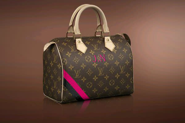 <b>Louis Vuitton Mon Monogram </b><br><br><b>Price: </b>Ranges<br><br> Why give a generic gift when you can personalize a product and be unique? Under the famed French luxury goods house's "Mon Monogram" program, you can personalize a version of classic LV luggage and handbags with different stripes styles, colors, and initials. Once you choose your item, from the Pegase 45 ($2,800) and 55 ($3,270) wheeled cabin cases, the iconic Speedy 40 ($1,030), or classic Keepall 55 ( $1,370), you can pick up to three initials, and choose vertical or diagonal stripes. The pieces come in 17 colors, each one based on the colors used to paint Louis Vuitton trunks for more than a century. This customization is available online, where you can view a simulated design with your finished product, and in all Louis Vuitton stores.