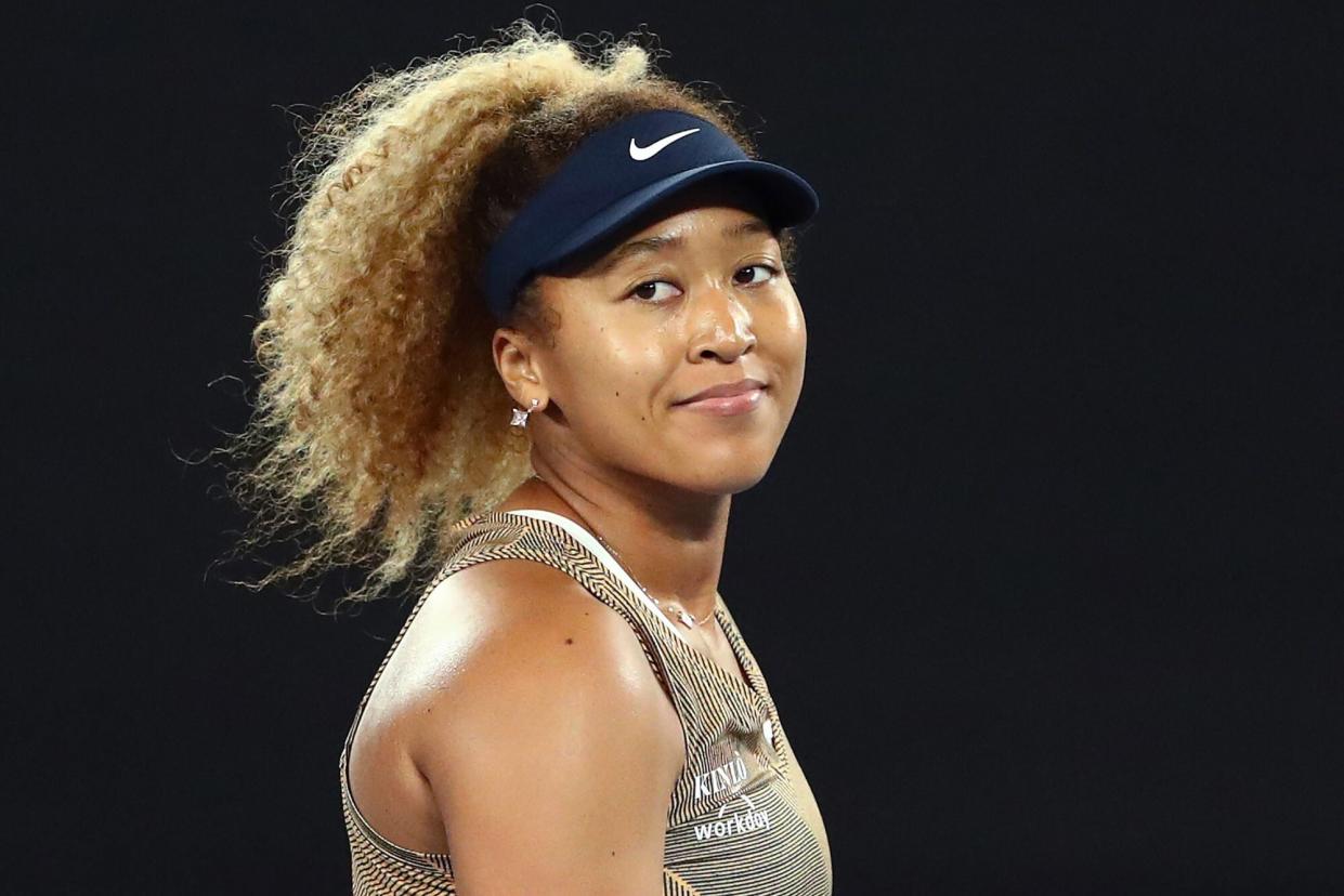 MELBOURNE, AUSTRALIA - JANUARY 07: Naomi Osaka of Japan looks on after her match against Andrea Petkovic of Germany during day five of the Melbourne Summer Set at Melbourne Park on January 07, 2022 in Melbourne, Australia. (Photo by Kelly Defina/Getty Images)