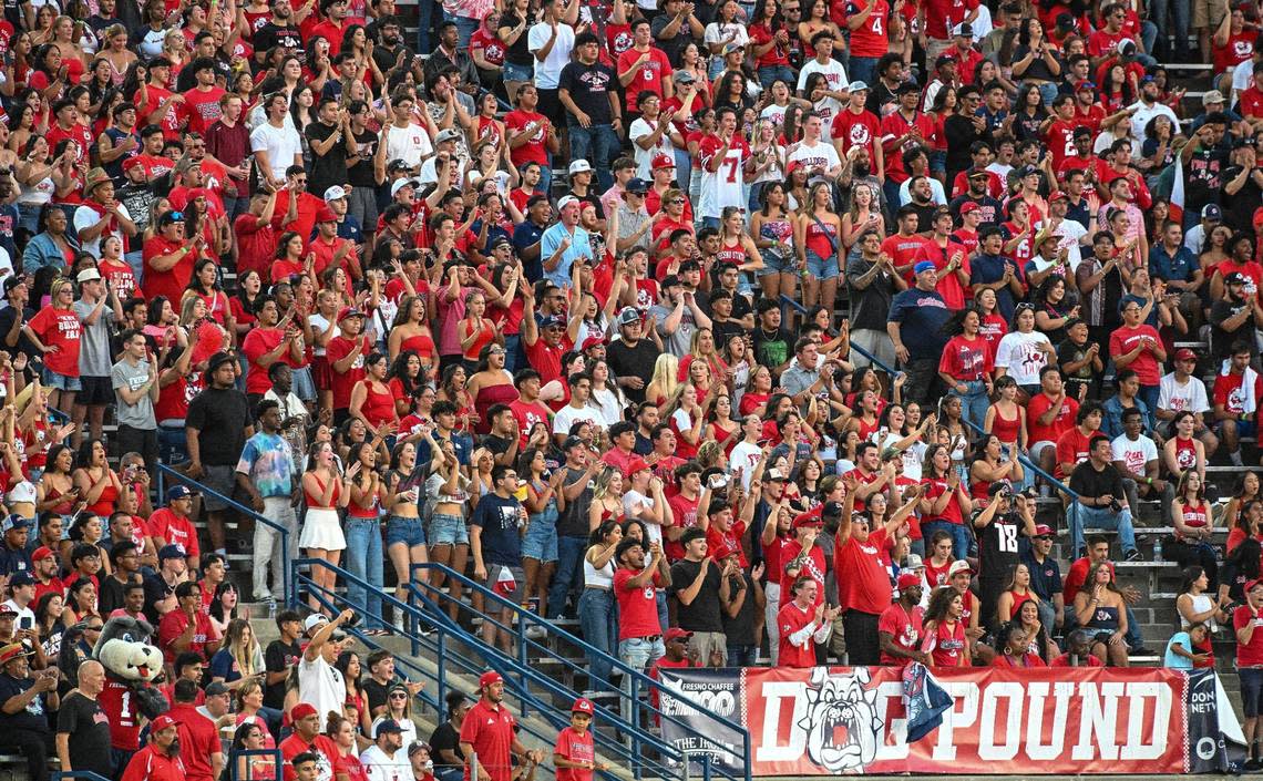 Fans in the student section’s Dog Pound cheer the Bulldogs during their first game of the season against Sacramento State at Valley Children’s Stadium on Saturday, Sept. 7, 2024.