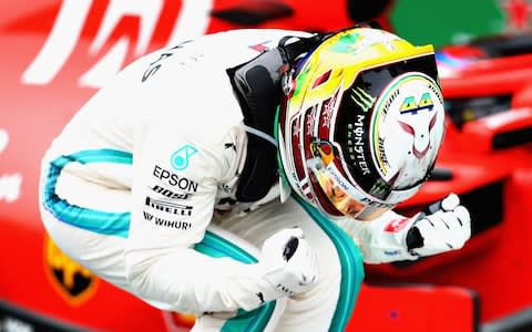 Race winner Lewis Hamilton of Great Britain and Mercedes GP celebrates in parc ferme during the Formula One Grand Prix of Brazil at Autodromo Jose Carlos Pace on November 11, 2018 in Sao Paulo, Brazil - Credit: Getty Images